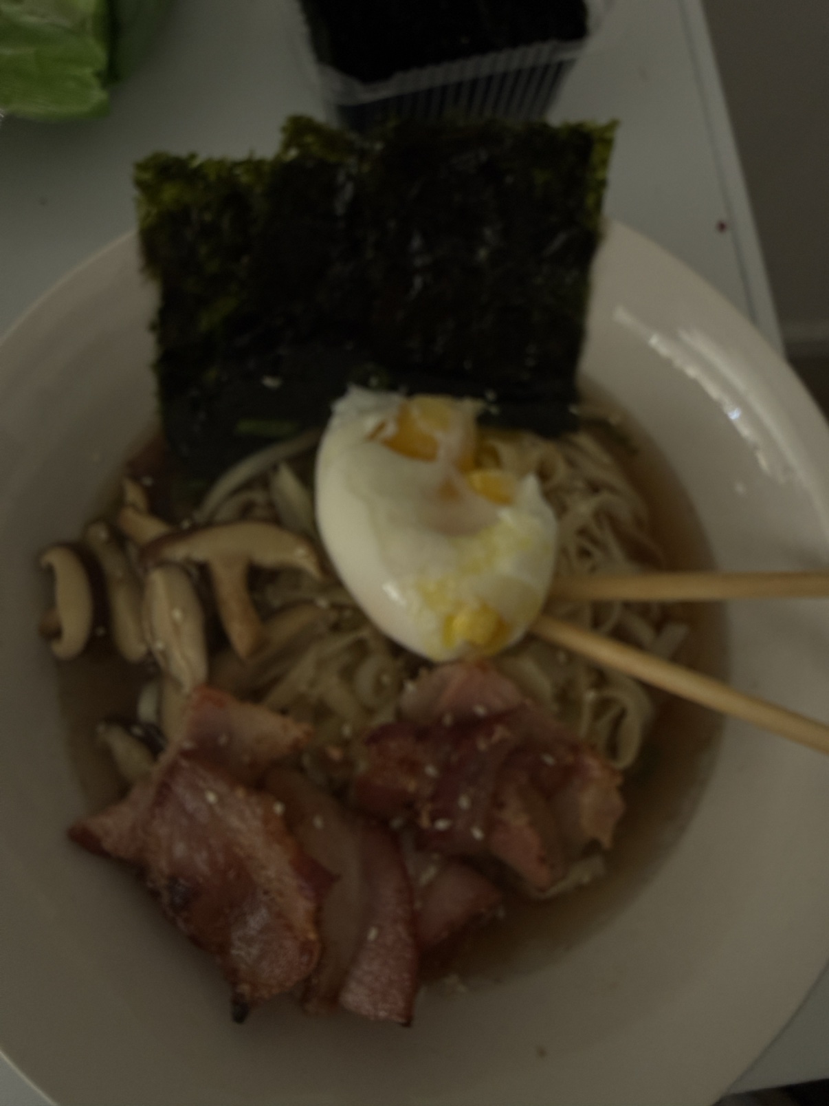 Homemade ramen with a soft egg, nori, mushrooms and meat